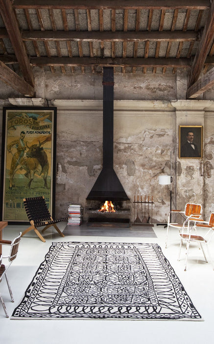 Black on White Estambul Rug in interior setting - nanimarquina