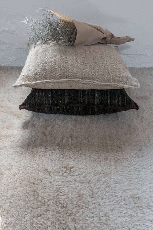 Wellbeing Heavy Kilim Cushion in interior setting - nanimarquina