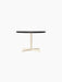 Front view of the Nook Lounge Table with a Linoleum Charcoal top and an Ivory powder-coated steel four-star base.