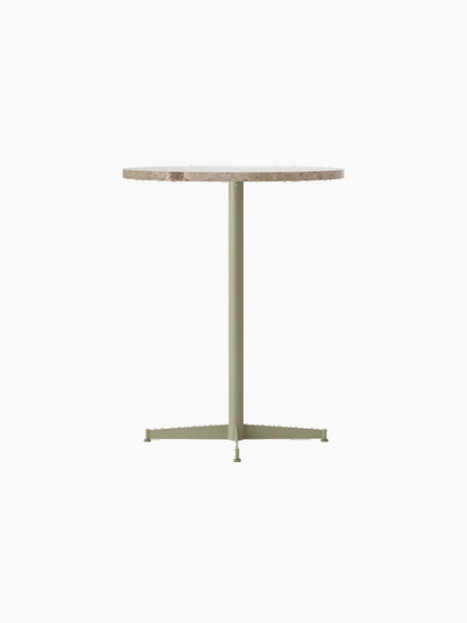 A straight-on view of the Nook Counter Table with a round Kunis Breccia stone top and an olive-coloured pedestal base.