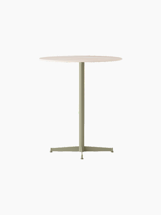 Angled view of the Nook Counter Table with a Kunis Breccia Stone top and an olive-coloured powder-coated steel pedestal base.