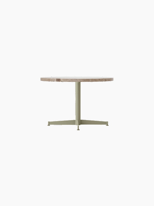 Side view of the Nook Lounge Table with a round Kunis Breccia stone top and an olive powder-coated steel four-star base.