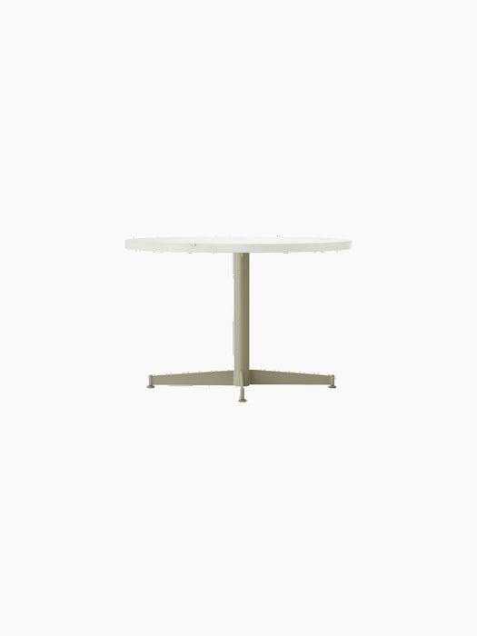 A front view of the Nook Lounge Table with a round, light-coloured tabletop and a slender, olive-coloured four-star base.