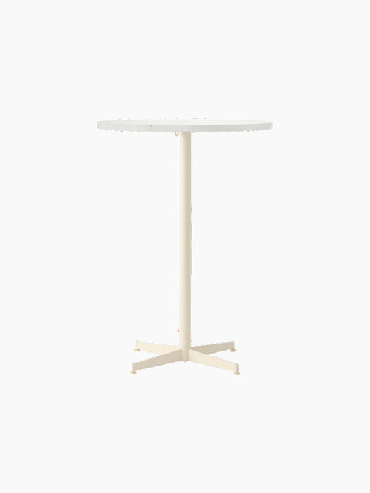 Front view of the Nook Bar Table, featuring a round white top and a slender ivory-coloured pedestal base with a 4-star foot.
