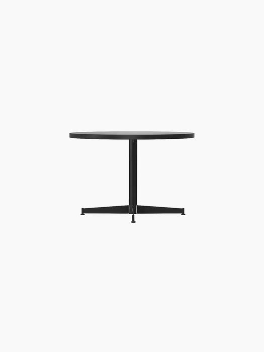 Front view of the Nook Lounge Table, featuring a round, light-coloured marble top and a black, four-star metal base.