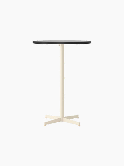 Front view of the Nook Bar Table, with a charcoal linoleum round tabletop and a powder-coated steel base in ivory.