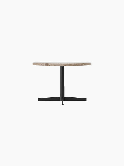 Angled view of the Nook Lounge Table, featuring a textured Kunis Breccia stone tabletop and a sleek black four-star base.