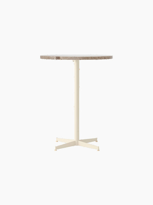 Front view of the Nook Counter Table with a round, patterned stone top and a slender, ivory-coloured central pedestal base.