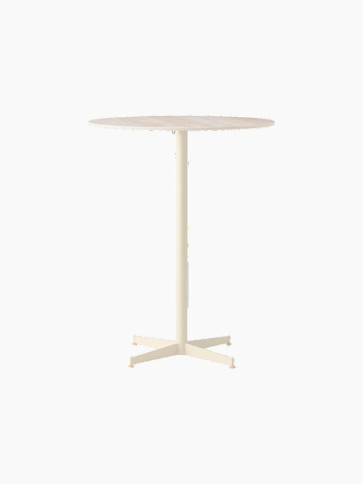 A front-facing image of the Nook Bar Table, featuring a round, light-coloured marble top and a slender, ivory steel base.