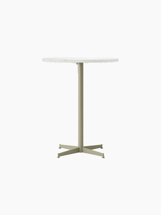 Full frontal view of the Nook Counter Table, featuring a round top and a slim, olive-coloured pedestal base with a star foot.