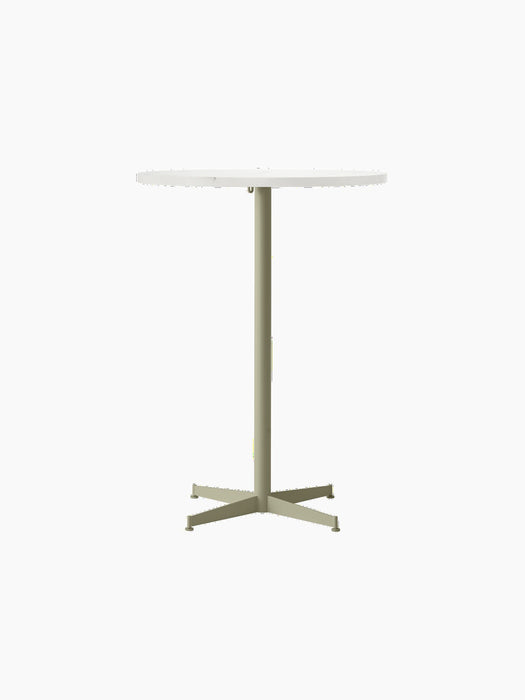 Nook Bar Table with a round, light-coloured top and a slender, ivory-coloured steel base with four feet.