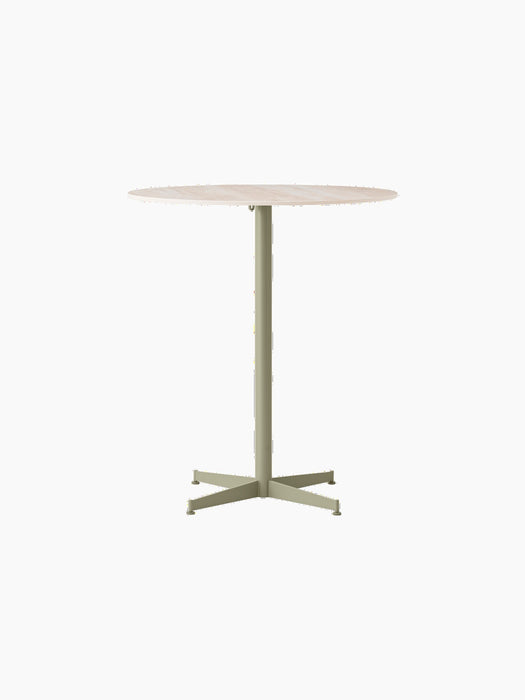 Front view of the Nook Counter Table with a round Kunis Breccia stone top and a four-legged, olive-coloured steel base.