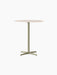 Front view of the Nook Counter Table with a round Kunis Breccia stone top and a four-legged, olive-coloured steel base.