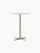 Front view of the Nook Bar Table with a round, light-coloured stone top and a slim, olive-coloured central pedestal base.