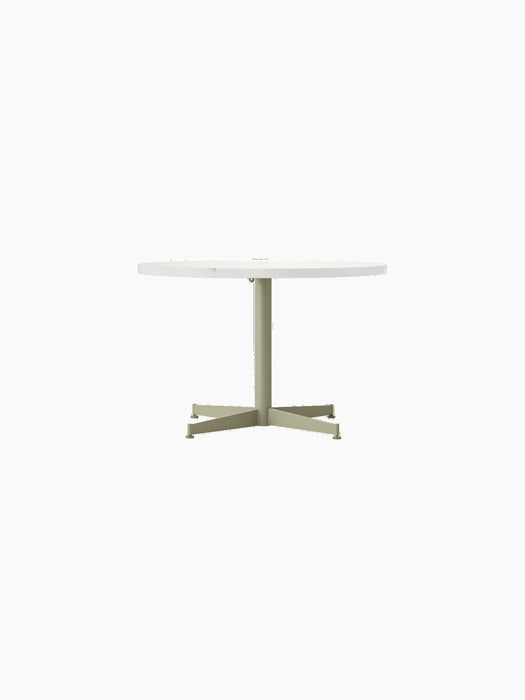 A front view of the Nook Lounge Table, featuring a round, white Estremoz marble top and an olive powder-coated steel base.