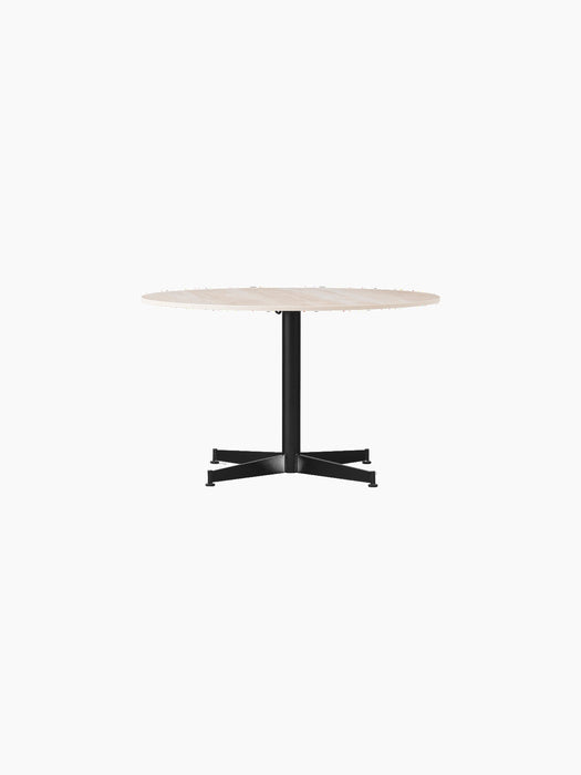 Front view of the Nook Lounge Table with a round Estremoz Marble top and a black powder-coated four-star base.