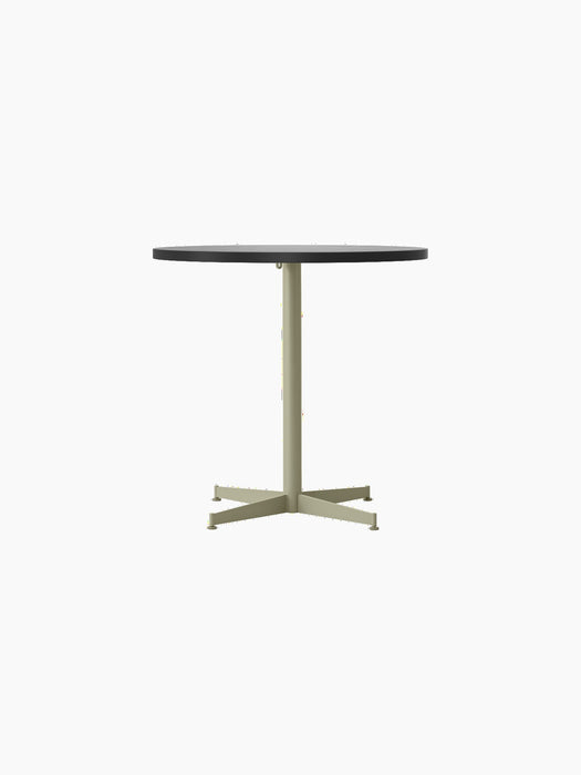 Front view of the Nook Dining Table, featuring a dark, round tabletop and a slender, olive pedestal with a four-star base.