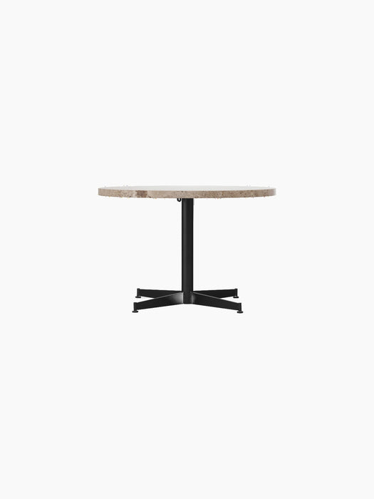 Front view of the Nook Lounge Table, featuring a round Kunis Breccia stone top and a slender black steel four-star base.