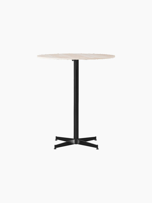 Front view of the Nook Counter Table, featuring a round Kunis Breccia stone tabletop on a black powder-coated steel base.