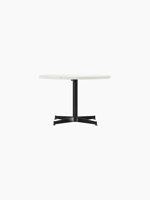 Front view of the Nook Lounge Table, featuring a white Estremoz marble top and a black powder-coated steel four-star base.