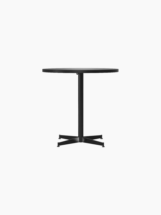 Front view of the Nook Dining Table, featuring a round top, a slim central stem, and a black four-star base.