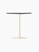 An angled shot of the Nook Bar Table, featuring a rectangular Kunis Breccia stone top and an ivory-coloured steel base.