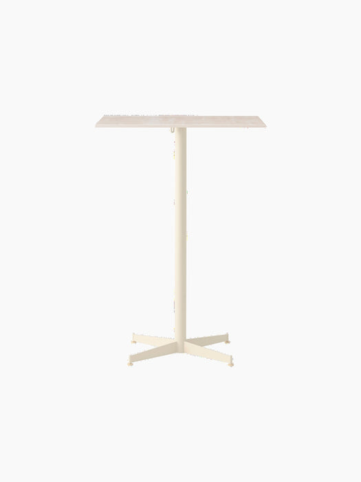 Front view of the Nook Bar Table with an ivory finish, a rectangular top, and a central column with an X-shaped base.