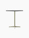 An angled view of the Nook Counter Table with a rectangular charcoal linoleum top on a slender olive pedestal base.