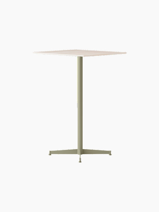An angle view of the Nook Bar Table, featuring an olive-coloured pedestal base with four legs and a light, square tabletop.