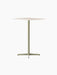 An angle view of the Nook Bar Table, featuring an olive-coloured pedestal base with four legs and a light, square tabletop.