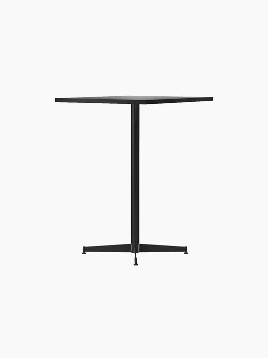 Angled view of the Nook Counter Table with a square, light-coloured top and a black central pedestal base with four feet.