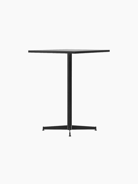 Angled view of the Nook Counter Table with a square Kunis Breccia Stone top and a black powder-coated steel pedestal base.