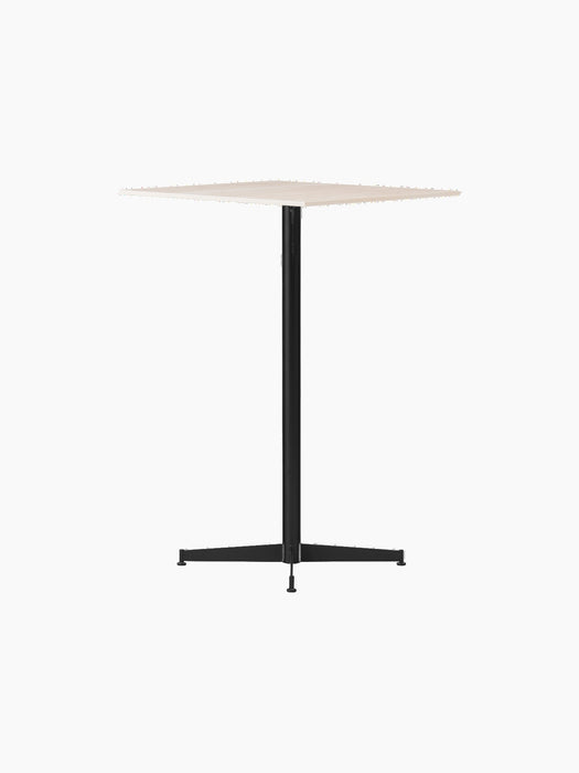 The Nook Bar Table shown from an angle, featuring a square light-coloured tabletop and a black powder-coated steel base.