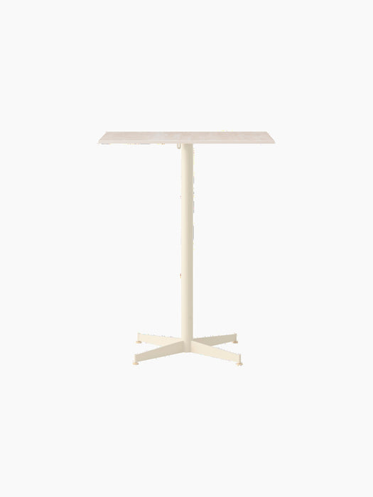 Front view of the Nook Counter Table with a rectangular Kunis Breccia Stone top and an ivory powder-coated steel base.