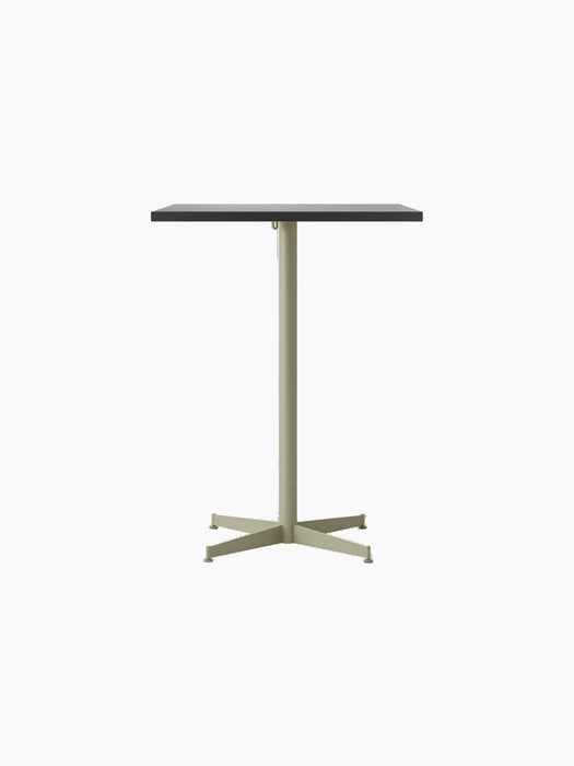 Front view of the Nook Counter Table, featuring a rectangular dark grey top on a tall column with a four-legged olive base.