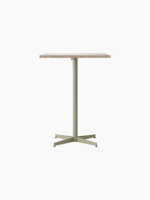 Front view of the Nook Counter Table with a rectangular Kunis Breccia stone top and an olive powder-coated steel base.