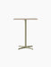 Front view of the Nook Counter Table with a rectangular Kunis Breccia stone top and an olive powder-coated steel base.