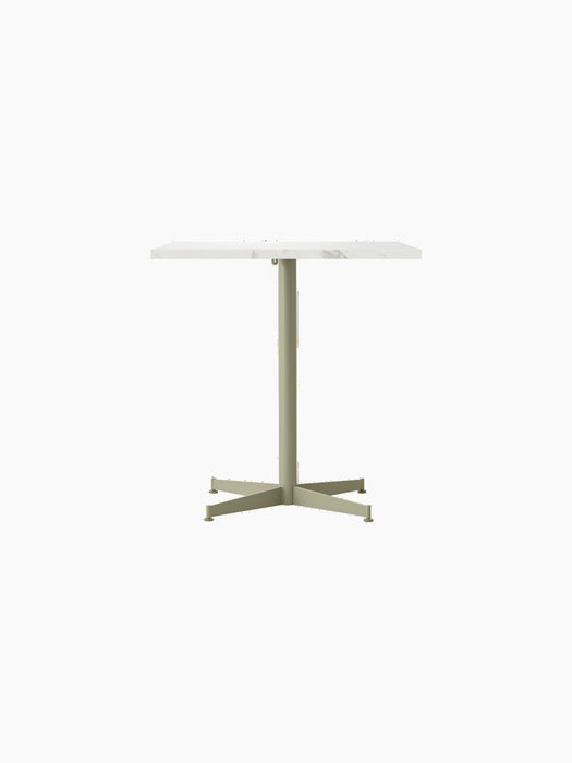 Front view of the Nook Dining Table with a rectangular light stone top with subtle veining and a slim, olive-coloured base.