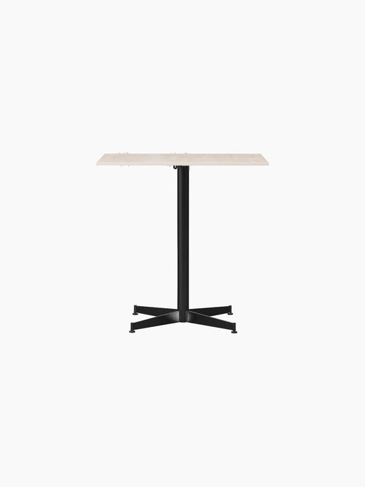 A front view of the Nook Dining Table, featuring a rectangular light-coloured stone top and a black powder-coated steel base.