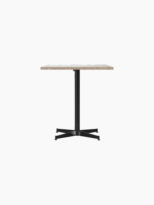 Front view of the Nook Dining Table with rectangular Kunis Breccia stone top and a black powder-coated steel four-star base.