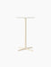 Front view of the Nook Bar Table, featuring a round Estremoz marble top on a tall, ivory powder-coated steel pedestal base.
