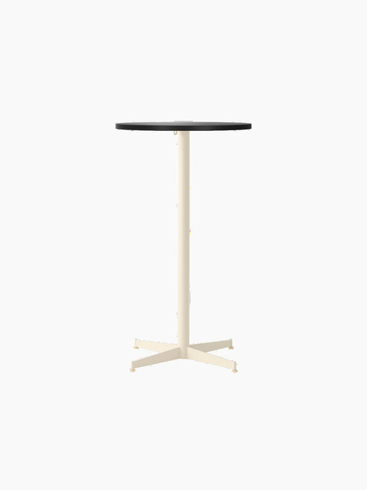 Front view of the Nook Bar Table with a round, charcoal linoleum top and a slender, ivory powder-coated steel column base.