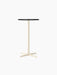 Front view of the Nook Bar Table with a round, charcoal linoleum top and a slender, ivory powder-coated steel column base.