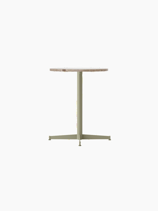 Front view of the Nook Dining Table with a round Kunis Breccia stone top and a slim, olive green four-star pedestal base.
