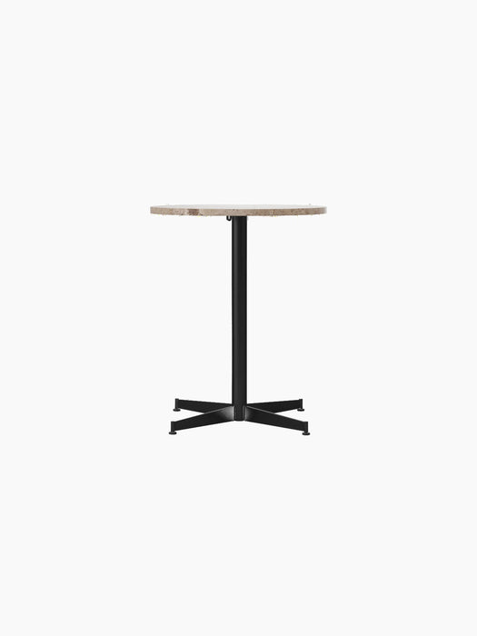 Front view of the Nook Dining Table with a round Kunis Breccia stone top and a slim black powder-coated steel four-star base.