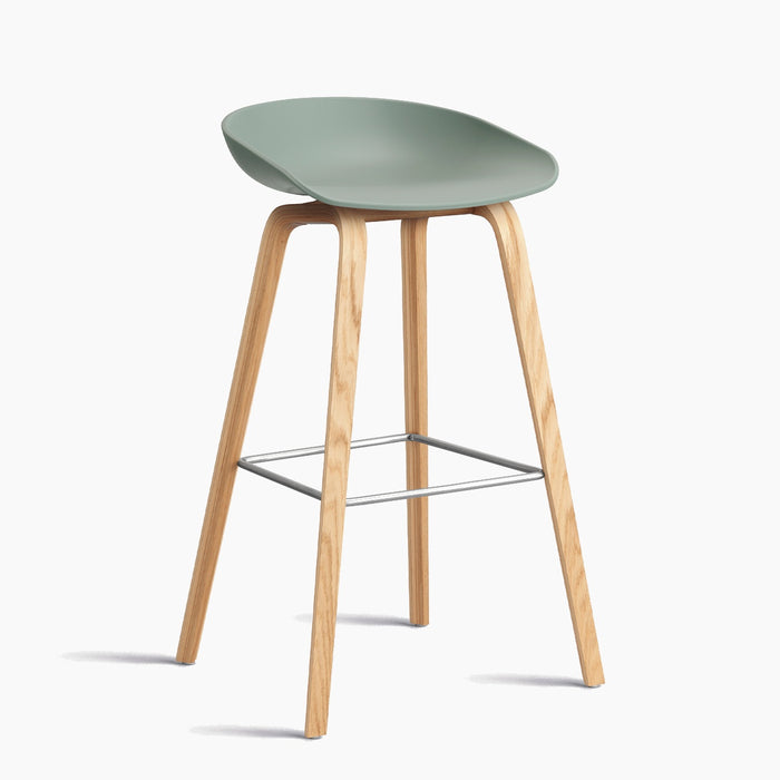 AAS32 Bar Stool Low Water-based lacquered oak veneer 4 leg base Stainless steel footrest H65 Standard glider - HAY