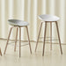 AAS32 Bar Stool Low Water-based lacquered walnut veneer 4 leg base Stainless steel footrest H65 Standard glider - HAY