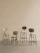 Four Afteroom chairs, bar and dining heights, with oak veneer and upholstered finishes against a beige wall.