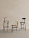A studio shot of the Afteroom Bar Chair, Counter Chair, and Dining Chair in different wood and upholstery options.