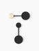 Two small, black Afteroom Coat Hangers on a white background. One horizontally with a brass detail, the other vertically.
